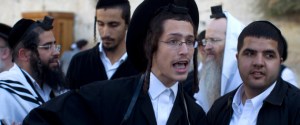 A Ultra-Orthodox Jewish man shout during a protest against members of the liberal Jewish religious group "Women of the Wall" who are wearing phylacteries and the "Tallit" shawl, traditional Jewish prayer apparel for men, as they pray at the plaza near the Western Wall, Judaism's holiest site, in Jerusalem's Old City on November 4, 2013. AFP PHOTO /AHMAD GHARABLI (Photo credit should read AHMAD GHARABLI/AFP/Getty Images)